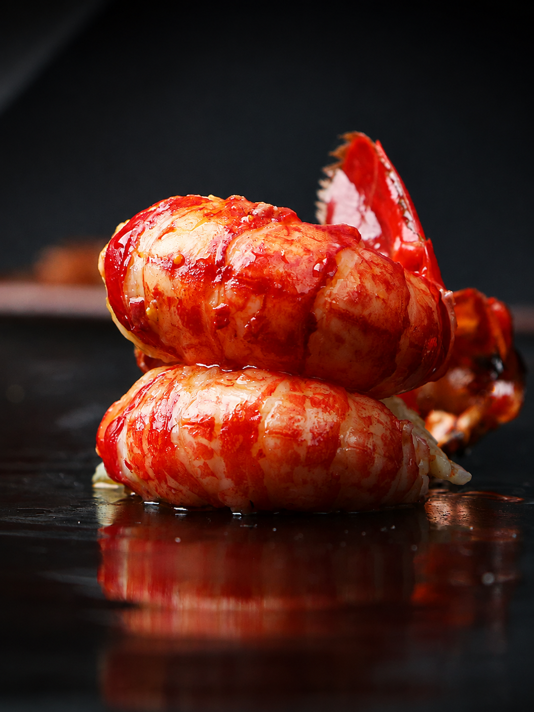 Fresh lobster tail meat with shell